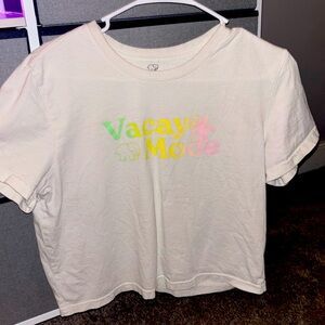 Ivory Ella “Vacay Mode”. White Cropped Tee